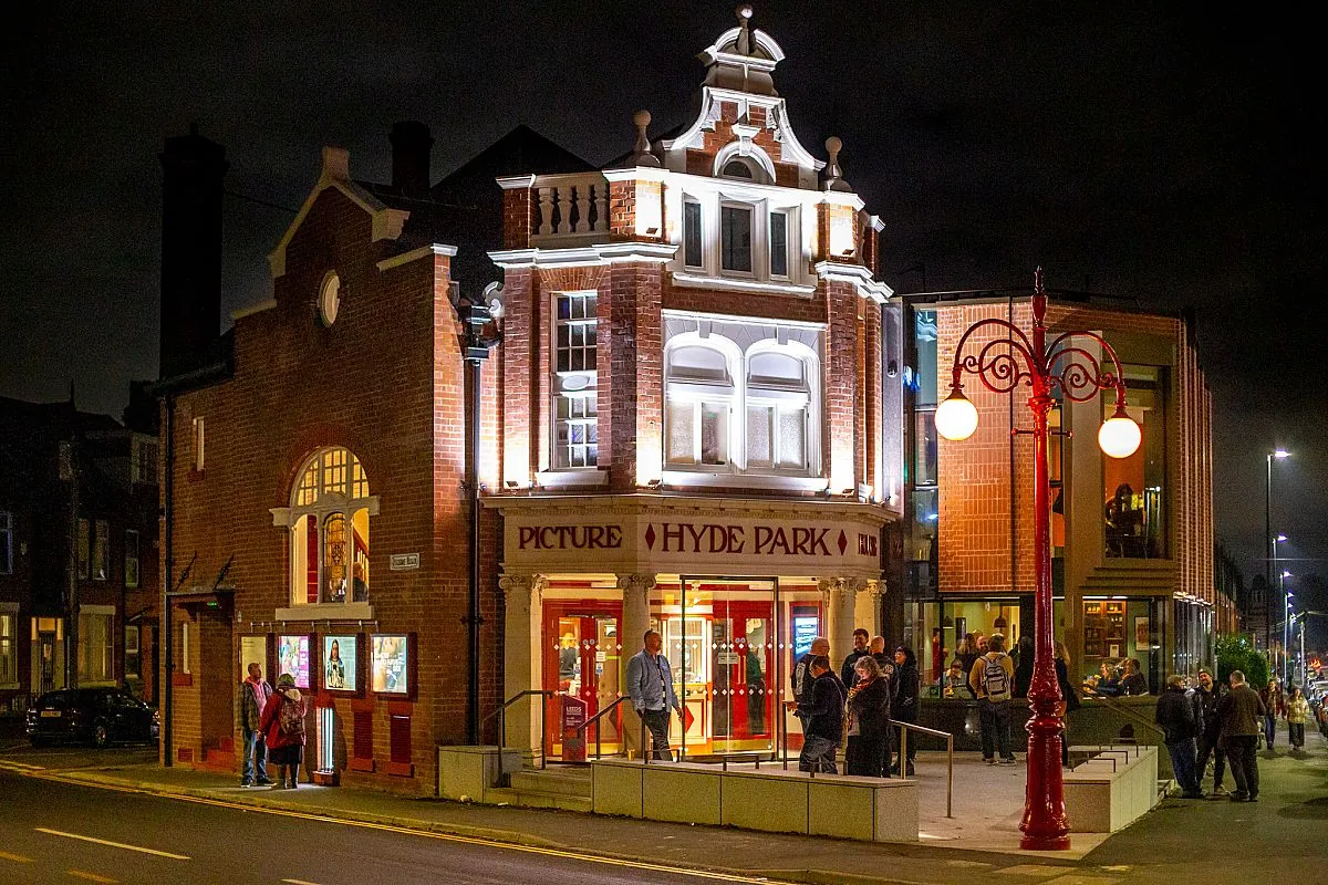 Hyde Park Picture House lit up at night on Brudenell Road, Hyde Park, Leeds